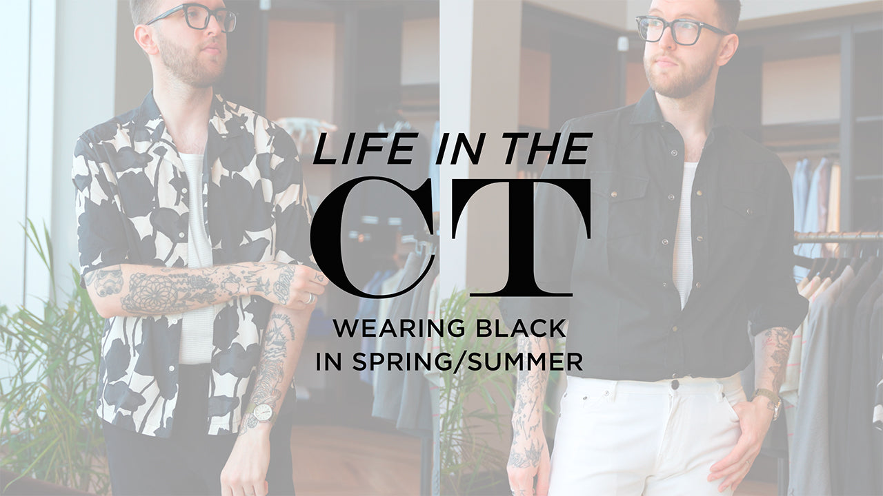 image with text "Life in the CT Wearing Black in Spring and Summer" image is of persona shopper CT modeling two different shirts, one is a black and white floral print and the other is a black western inspired button up from Brunello Cucinelli