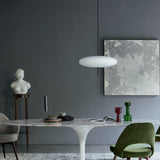 Herman Miller Saarinen Dining Table 78" Oval with White Base and Marble Top Lifestyle Image (6605647970419)