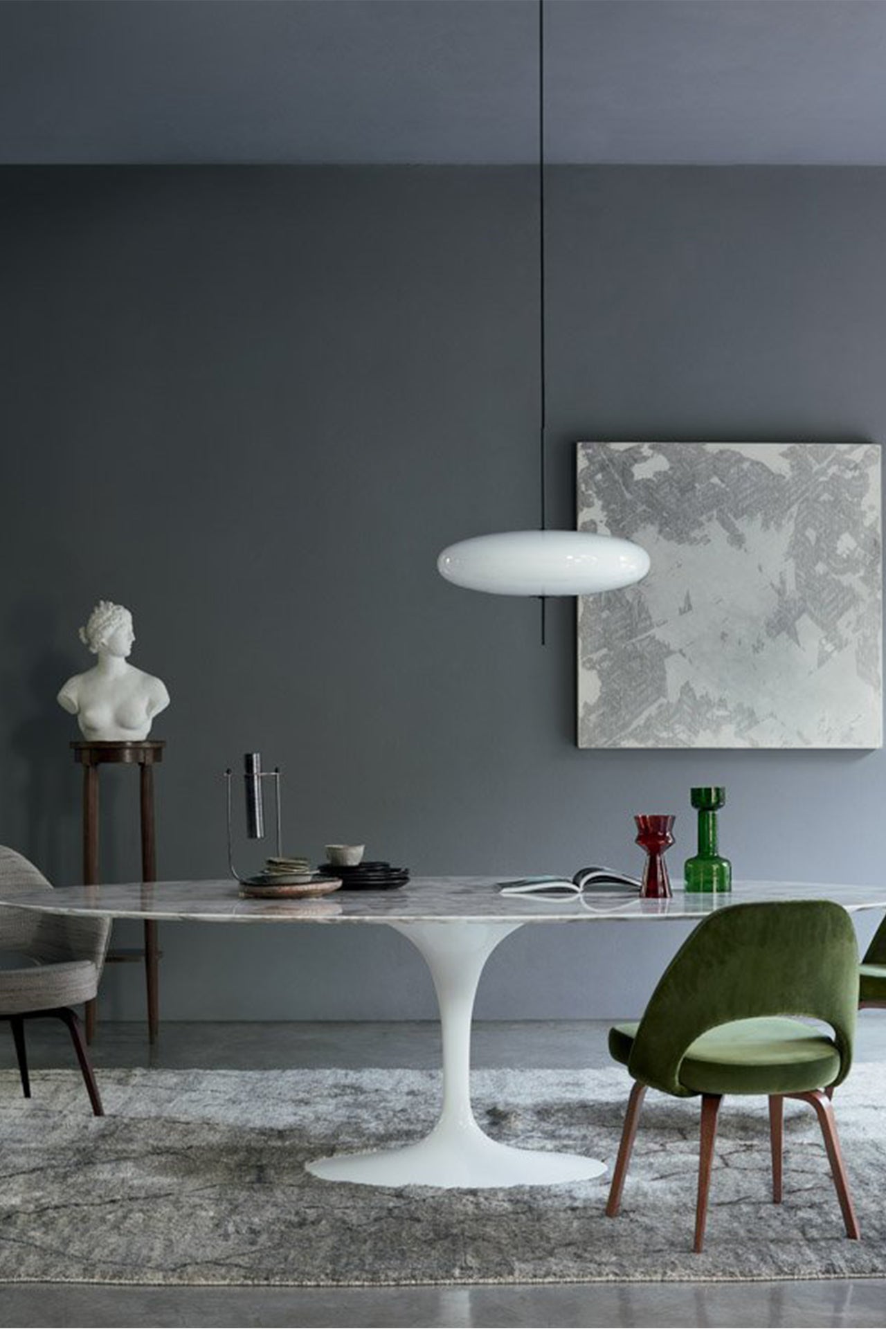 Herman Miller Saarinen Dining Table 78" Oval with White Base and Marble Top Lifestyle Image (6605647970419)