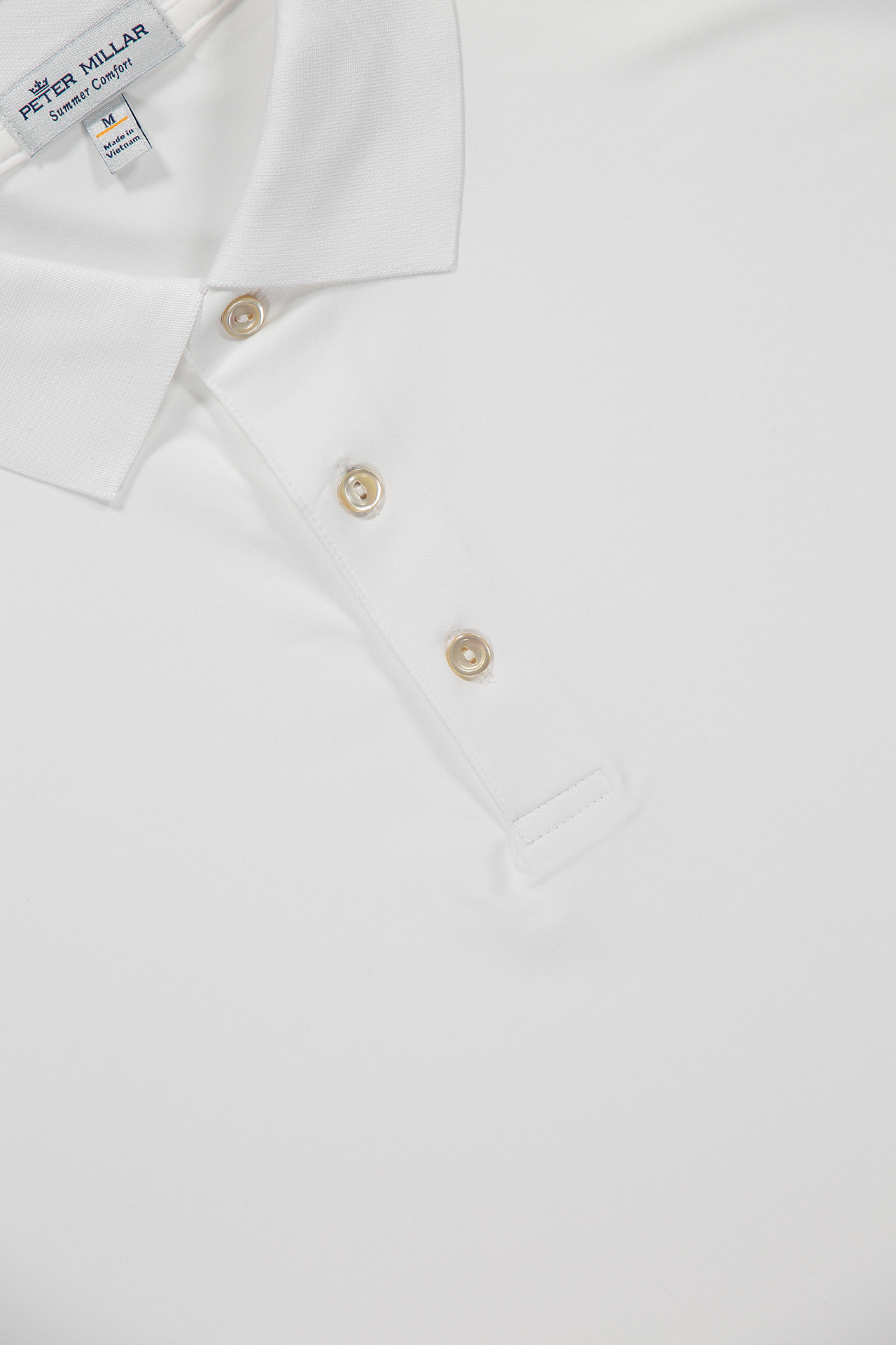 Peter Millar Solid Performance Jersey Polo in White - Collar Detail Image (6606330462323)