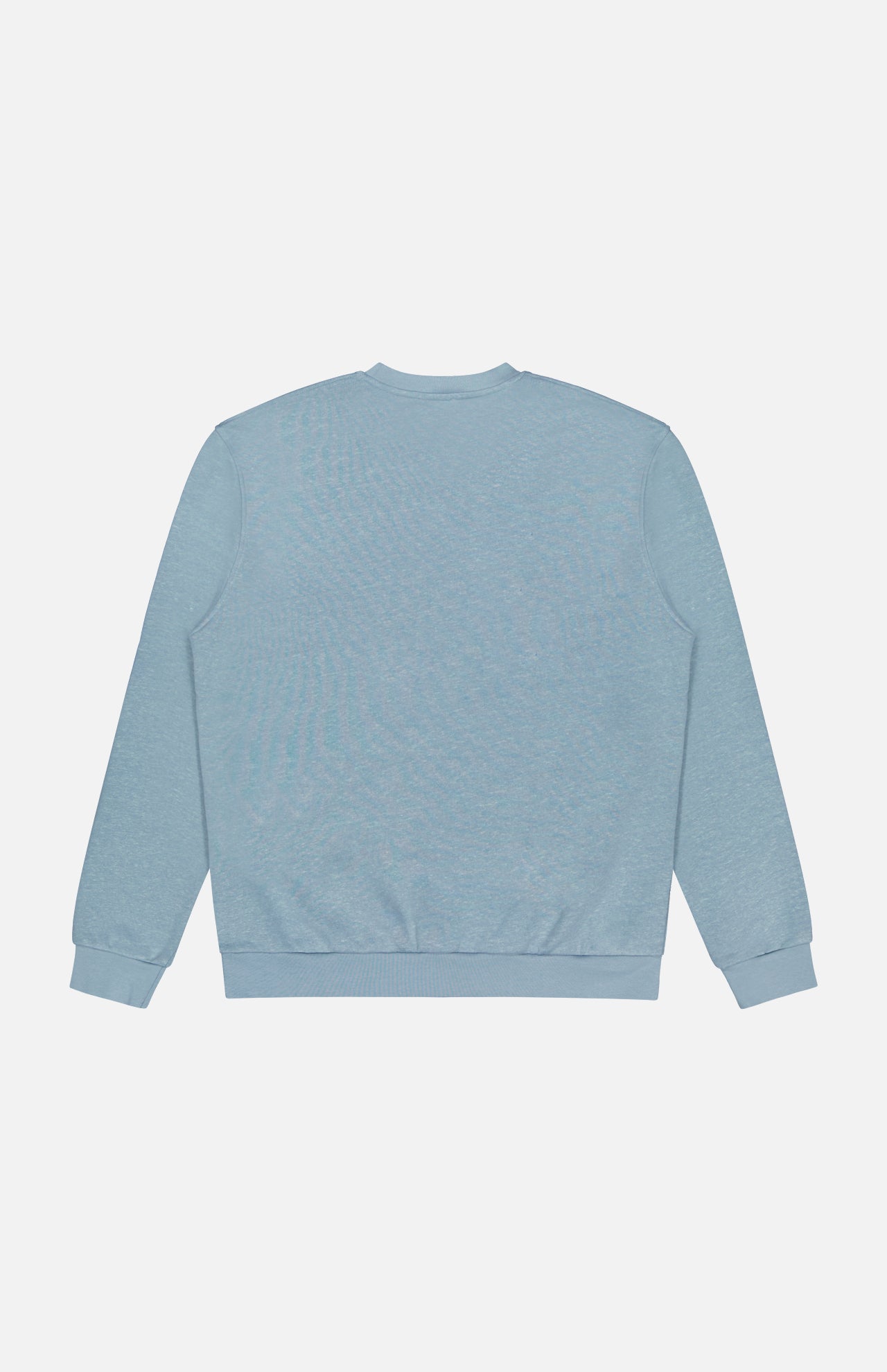 The Cotton Linen Crewneck Sweatshirt by 04651/ A TRIP IN A BAG is shown from the back in light blue, featuring long sleeves, ribbed cuffs and waistband, made from a soft organic cotton blend on a white background.