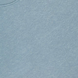 Close-up of the 04651/ A TRIP IN A BAG Cotton Linen Crewneck Sweatshirt in light blue, highlighting the fabric texture and a white collar tag with printed text.