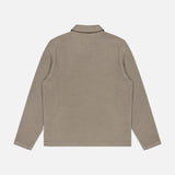 Back view of a tan CW Quarter Zip Polo Pullover by 04651/ A TRIP IN A BAG with long sleeves and a collared neckline.