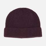 Deep maroon Extreme Cashmere Beanie in ribbed knit cashmere with a folded cuff.