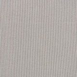 Close-up of a light gray, taupe-toned ribbed knit Extreme Cashmere Scarf by 04651/ A TRIP IN A BAG.