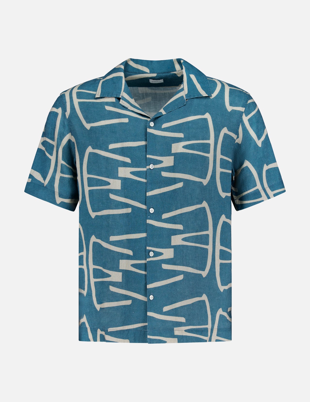 The Hansen Retro Cuba Shirt by 04651/ A TRIP IN A BAG is a short-sleeved, button-up linen shirt with a blue base and bold white geometric patterns. Its Cuban collar and relaxed fit add retro flair to your wardrobe.