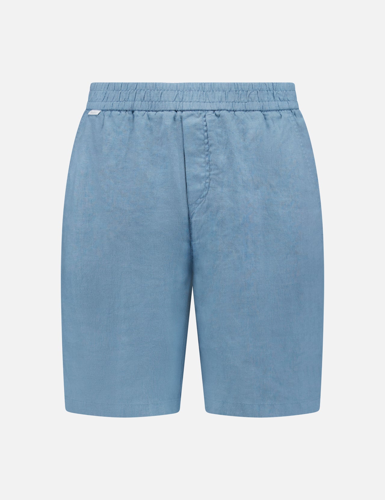 The Linen Bermuda Short by 04651/ A TRIP IN A BAG features light blue linen, an elastic waistband, and a front seam. Expertly crafted in Portugal, it’s shown against a plain white background.