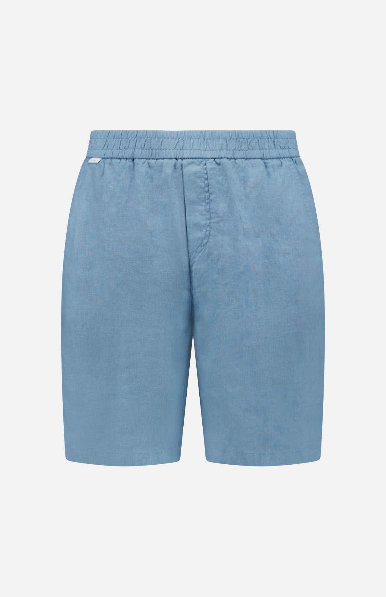 The Linen Bermuda Short by 04651/ A TRIP IN A BAG features light blue linen, an elastic waistband, and a front seam. Expertly crafted in Portugal, it’s shown against a plain white background.