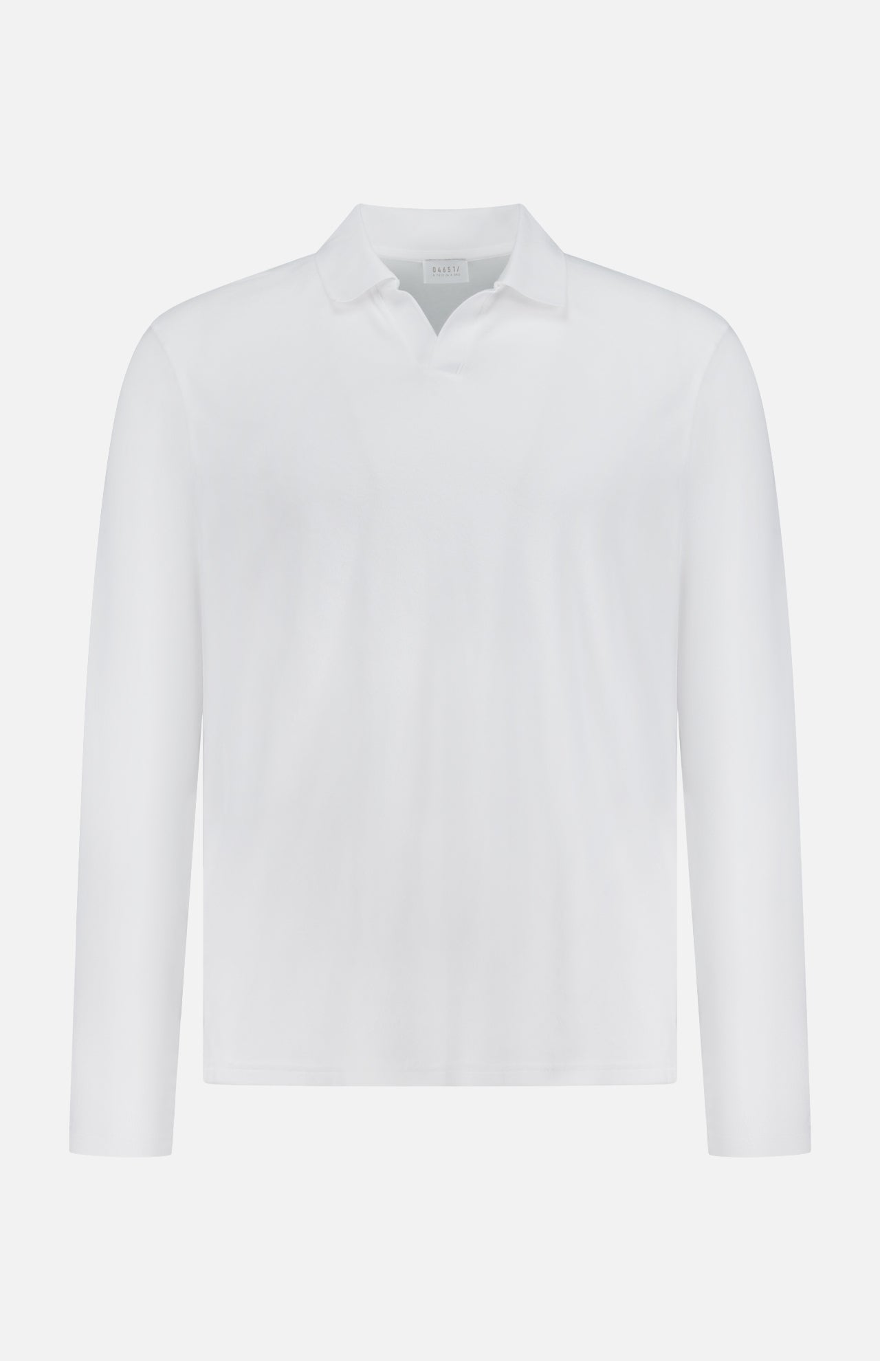 The Terry Johnny Long Sleeve Collar Polo Shirt by 04651/ A TRIP IN A BAG is a classic white polo crafted from soft cotton terry, featuring a simple collar and shown against a clean white background.