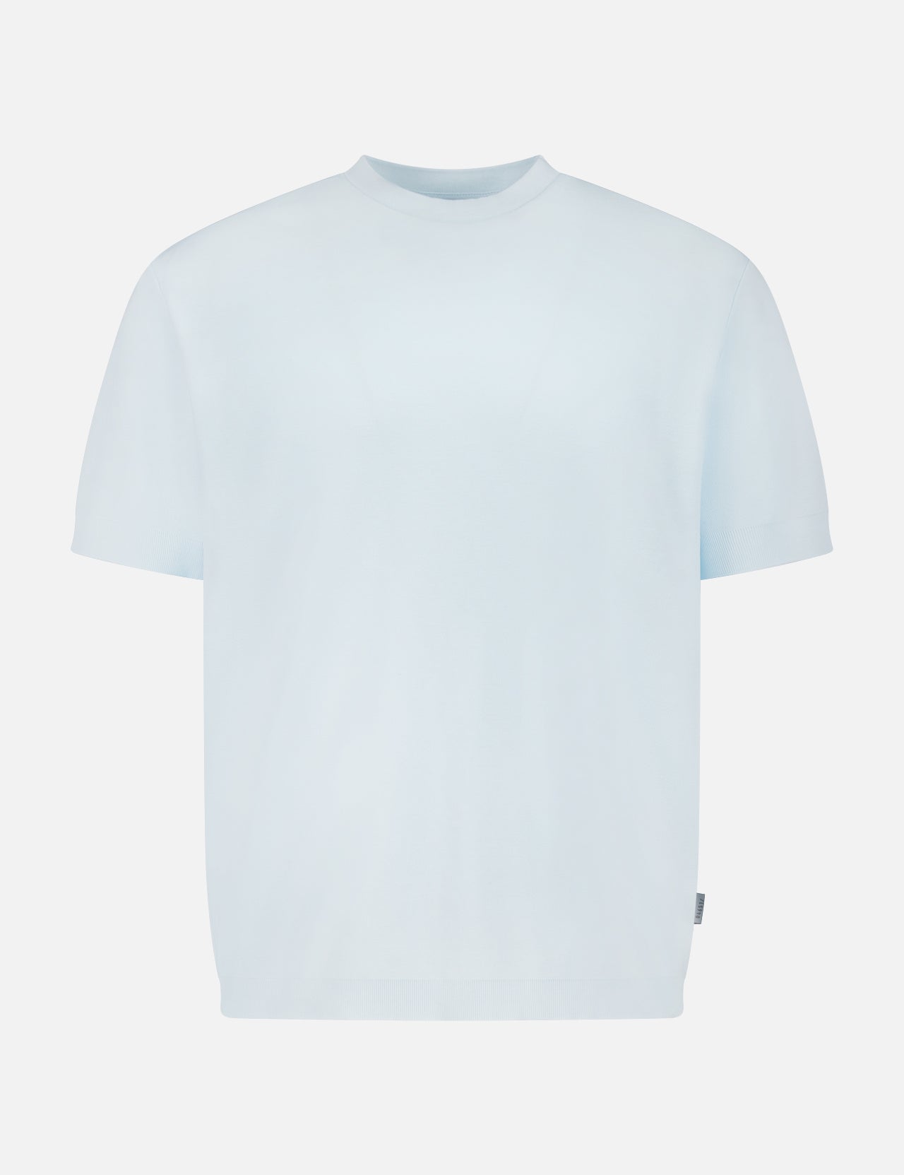 The TP T-shirt by 04651/ A TRIP IN A BAG is a pure cotton, light blue short-sleeve crew neck tee shown on a white background—perfect for classic, everyday comfort.