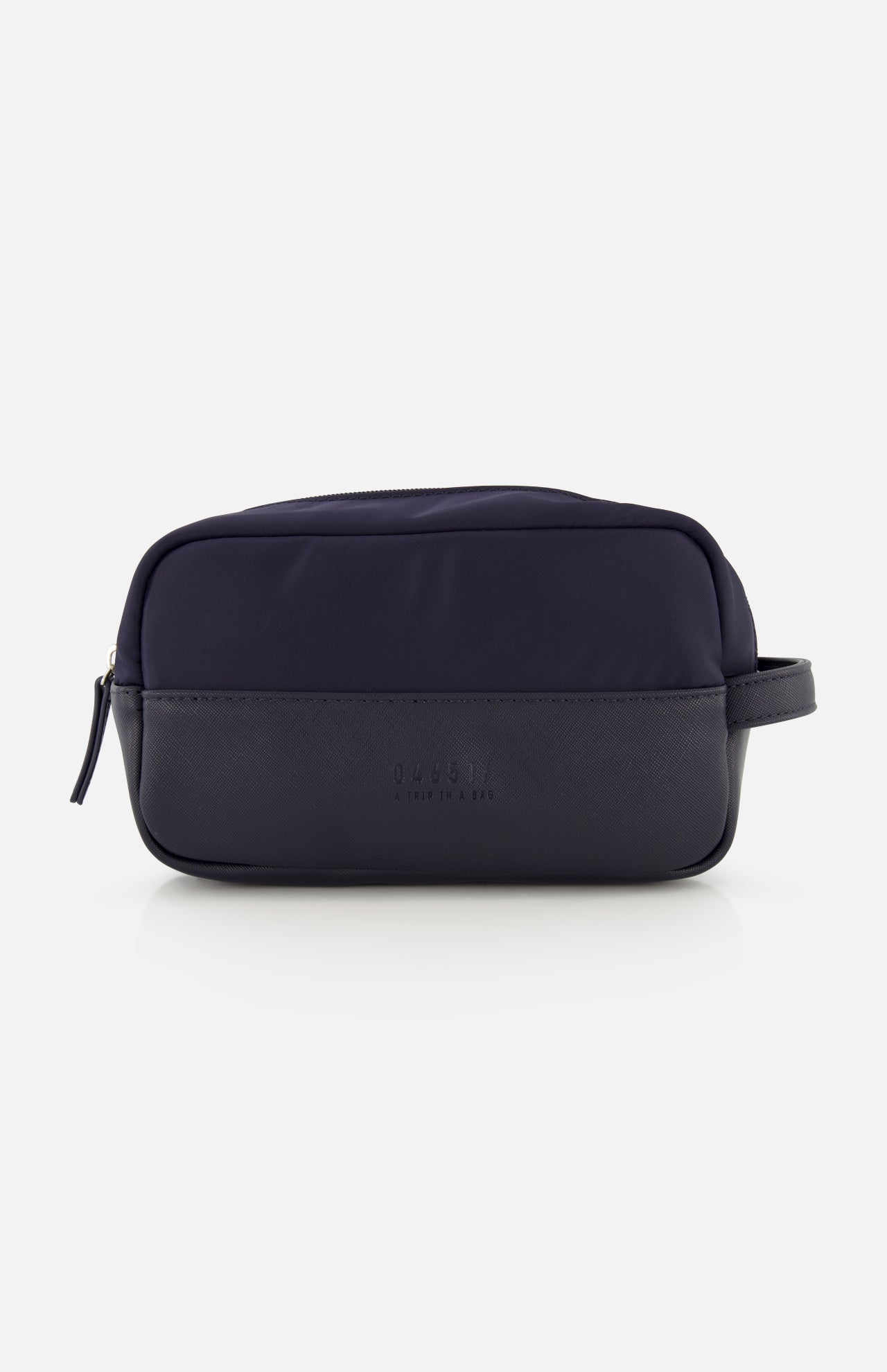 The 04651/ A TRIP IN A BAG Travel Washbag, featuring a zippered top, side handle, and embossed front logo, is shown against a white background—ideal as a compact travel toiletry bag for your essentials.