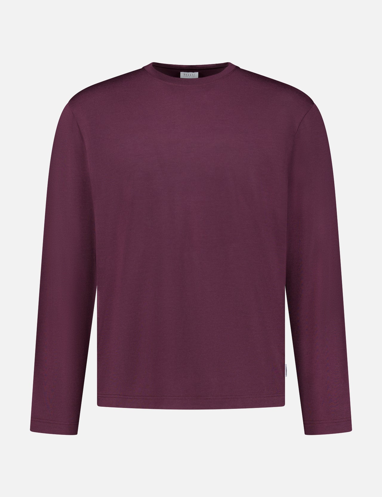 The WJ Long Sleeve T-shirt by 04651/ A TRIP IN A BAG, a plain burgundy crew neck shirt made in Portugal, is displayed on a white background.