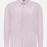 The Oxford Casual Fit Shirt by 100 HANDS is a light pink, long-sleeve button-up crafted from luxury cotton, featuring a classic collar and white buttons. Handmade in India, it is displayed against a plain white background.
