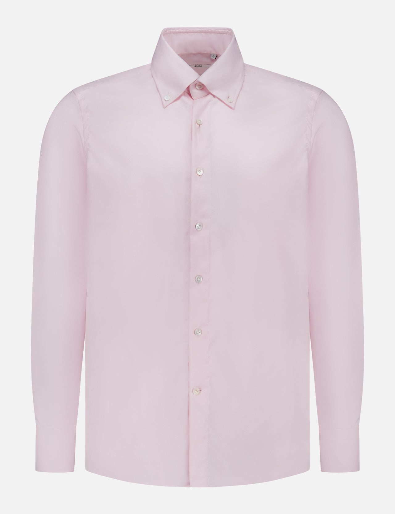The Oxford Casual Fit Shirt by 100 HANDS is a light pink, long-sleeve button-up crafted from luxury cotton, featuring a classic collar and white buttons. Handmade in India, it is displayed against a plain white background.