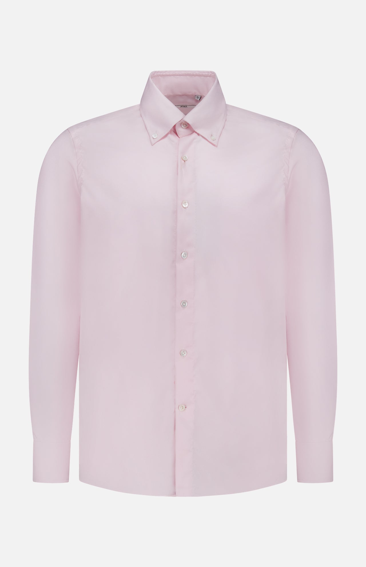 The Oxford Casual Fit Shirt by 100 HANDS is a light pink, long-sleeve button-up crafted from luxury cotton, featuring a classic collar and white buttons. Handmade in India, it is displayed against a plain white background.