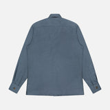 The 100 HANDS Seersucker Dress Shirt, shown from the back in blue with long sleeves, a collar, buttoned cuffs, and a straight hem, is displayed against a plain white background.