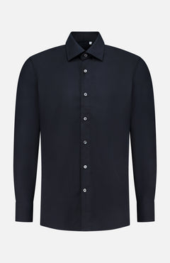 A plain black silk casual fit dress shirt by 100 HANDS, featuring a classic collar and white buttons, displayed on a white background in the brand’s signature timeless style.