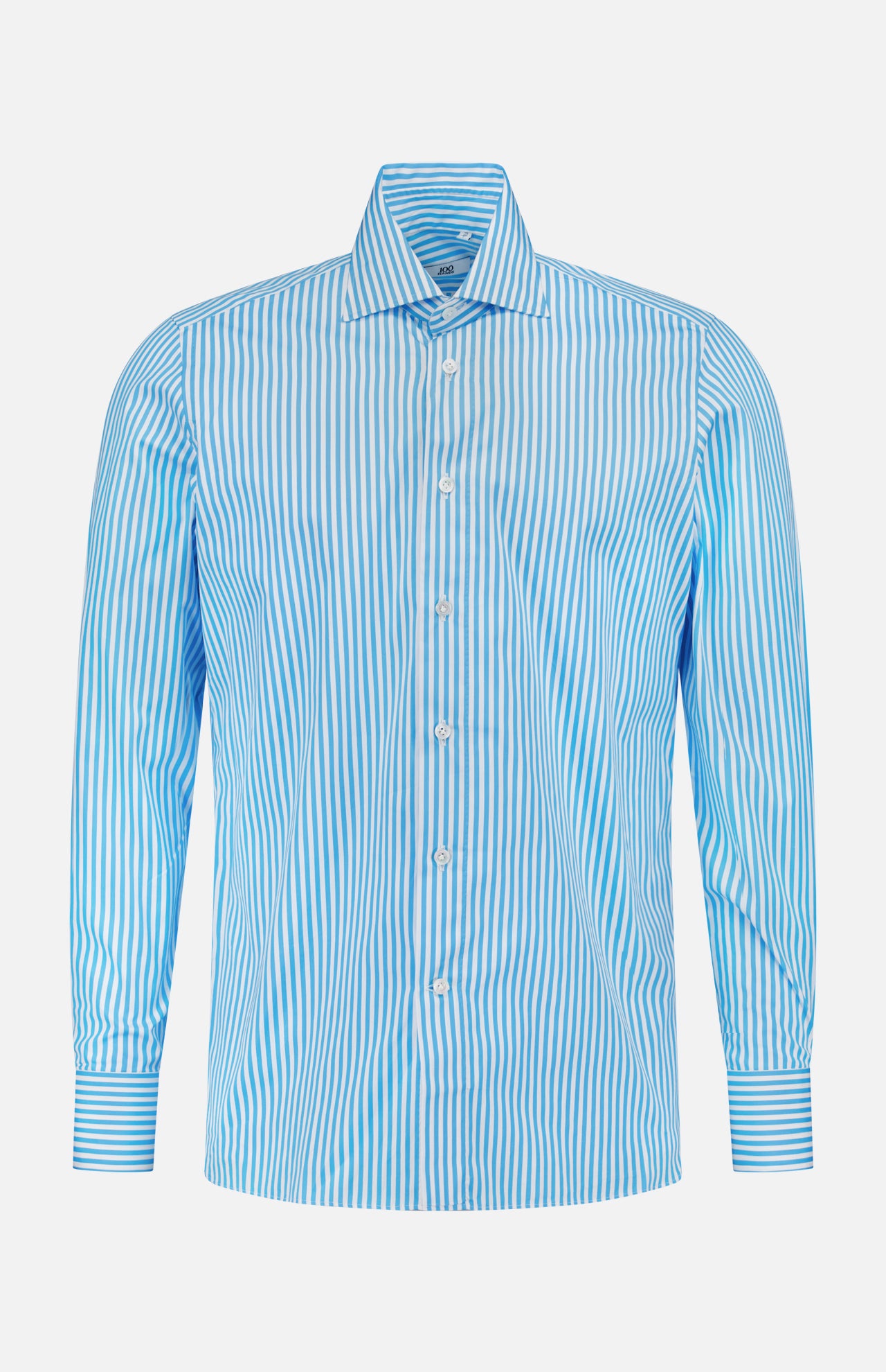 The 100 HANDS Stripe Cotton Shirt features blue and white vertical stripes, a collared neckline, long sleeves, and a button-down front. It’s made from 100% cotton and is shown against a plain white background.