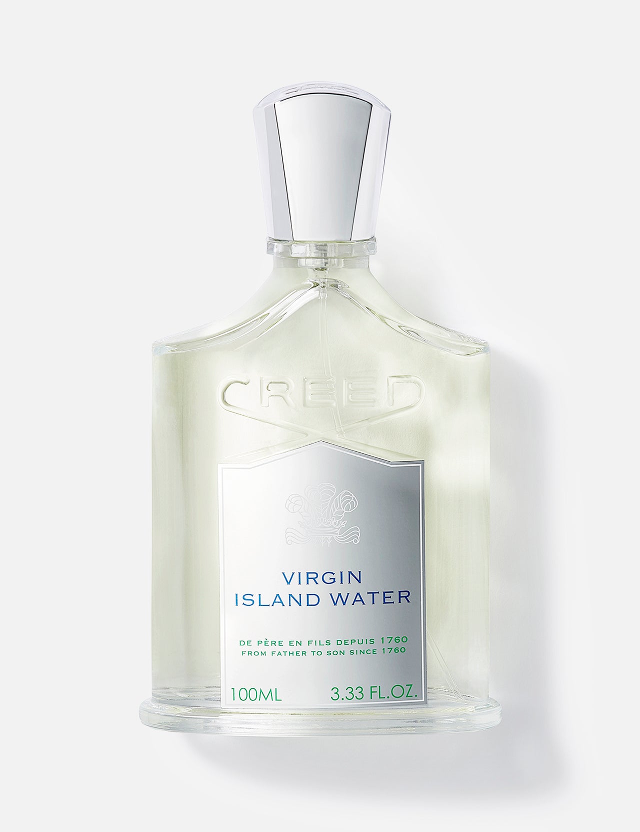 A clear glass CREED bottle of Virgin Island Water 100Ml, with a silver cap and white-silver label, displaying the brand and fragrance name, offers a refreshing tropical scent highlighted by Jamaican lime.