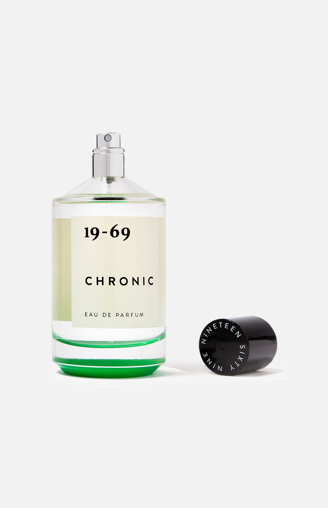 A clear glass bottle of 19-69 Chronic EDP 100 ml Fragrance, a bold green cannabis perfume, sits with its black cap and NINETEEN SIXTY NINE label against a white background.