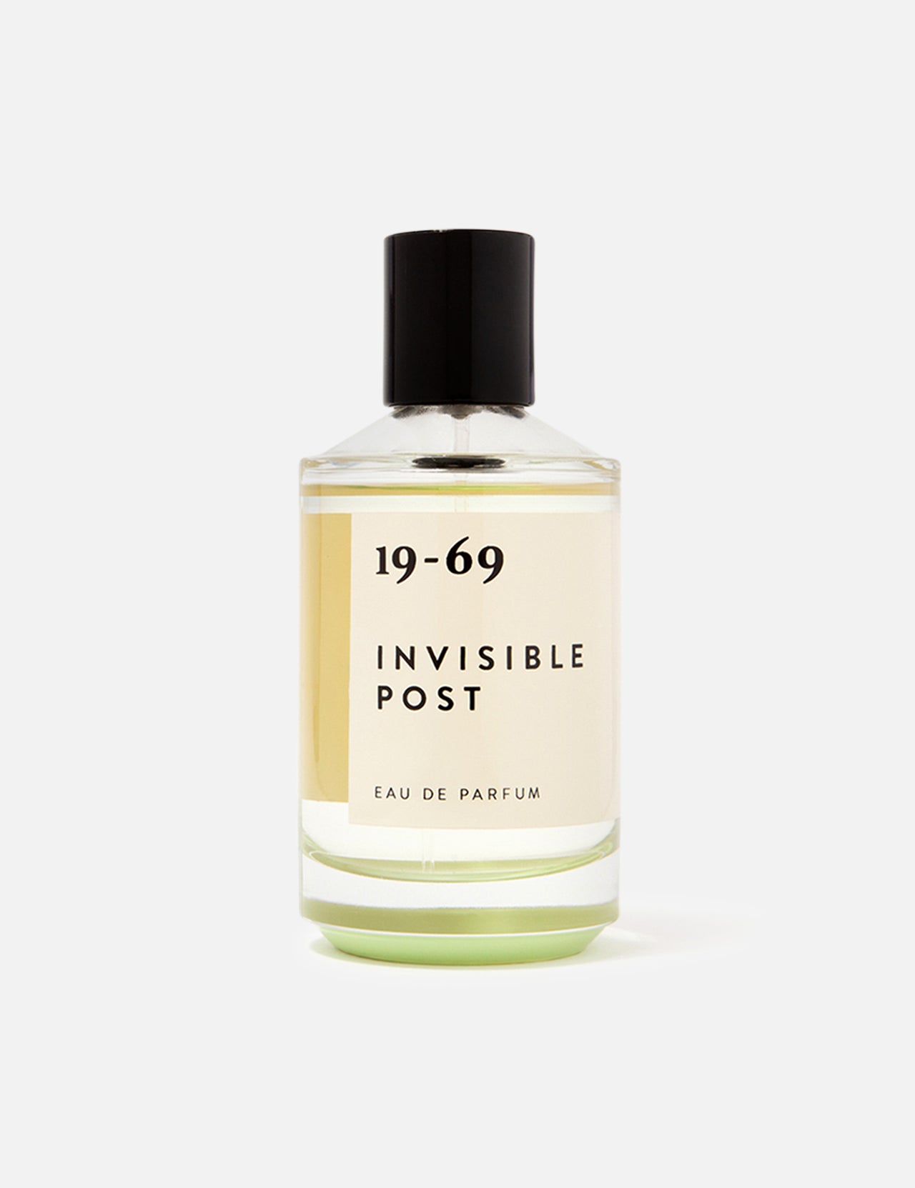 A 100 ml bottle of 19-69 Invisible Post EDP Fragrance, a unisex perfume with sandalwood notes and a black cap, is displayed against a white background.