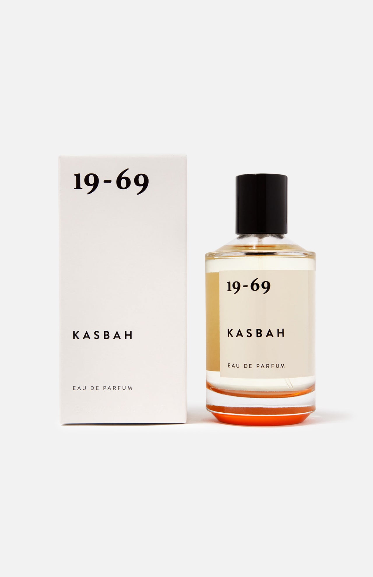 A 100 ml bottle of 19-69 Kasbah EDP Fragrance sits beside its white box, both displaying minimalist black text from the 19-69 brand on a clean white background.