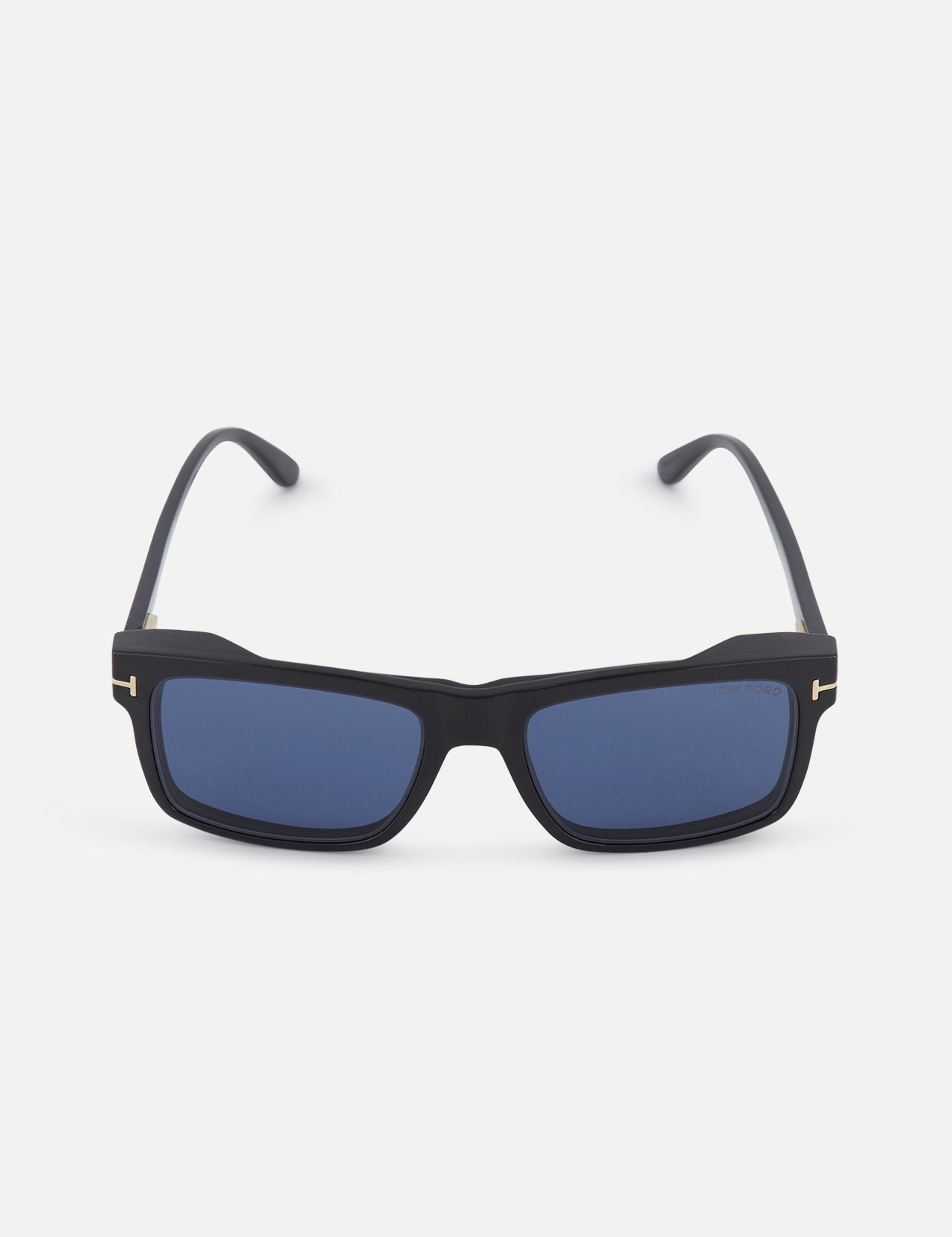 The TOM FORD Blue Block Rectangular Magnetic Optics sunglasses feature black rectangular frames and blue-tinted lenses with blue light protection, displayed facing forward on a plain white background.