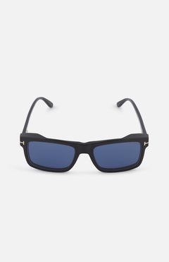 The TOM FORD Blue Block Rectangular Magnetic Optics sunglasses feature black rectangular frames and blue-tinted lenses with blue light protection, displayed facing forward on a plain white background.