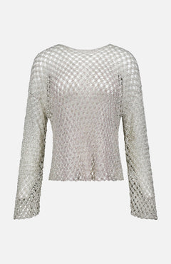 The TWP Hand Crochet Slash Neck Top is a silver, long-sleeved open-knit sweater with a fishnet-style mesh, round neckline, and flared hem, shown on a plain white background.