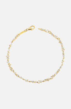 The SUZANNE KALAN Classic Diamond Chain Tennis Bracelet is crafted in 18K gold, featuring sparkling diamonds set along a fine linked chain with a lobster clasp, shown on a plain white background.