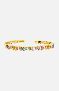 The Pastel Sapphire Bangle by SUZANNE KALAN is a yellow gold, open design bangle featuring a row of rectangular, multicolored sapphires across the top—ideal for stacking with your favorite bracelets.