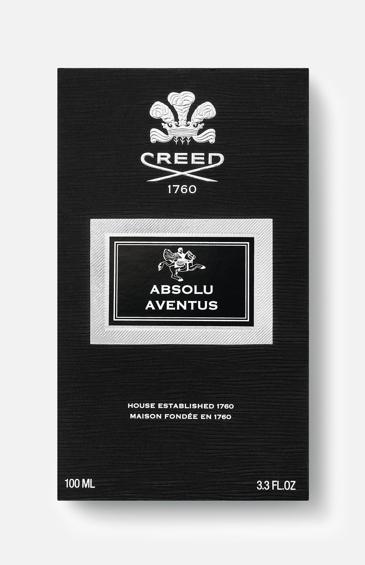 Sleek black box of CREED’s Absolu Aventus 100 ml Fragrance, highlighted by a striking white crest, "CREED 1760" text, and a silver-bordered label—with details including "100 ML" and "House Established 1760" at the bottom—an elegant presentation for this legendary scent celebrated for its vibrant pineapple patchouli notes and refined citrus aroma.