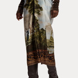 This RALPH LAUREN COLLECTION Scenic Silk Twill Pencil Skirt is made in Italy and features a pastoral landscape print of people and horses, bordered by leopard print trim at the waist and hem.