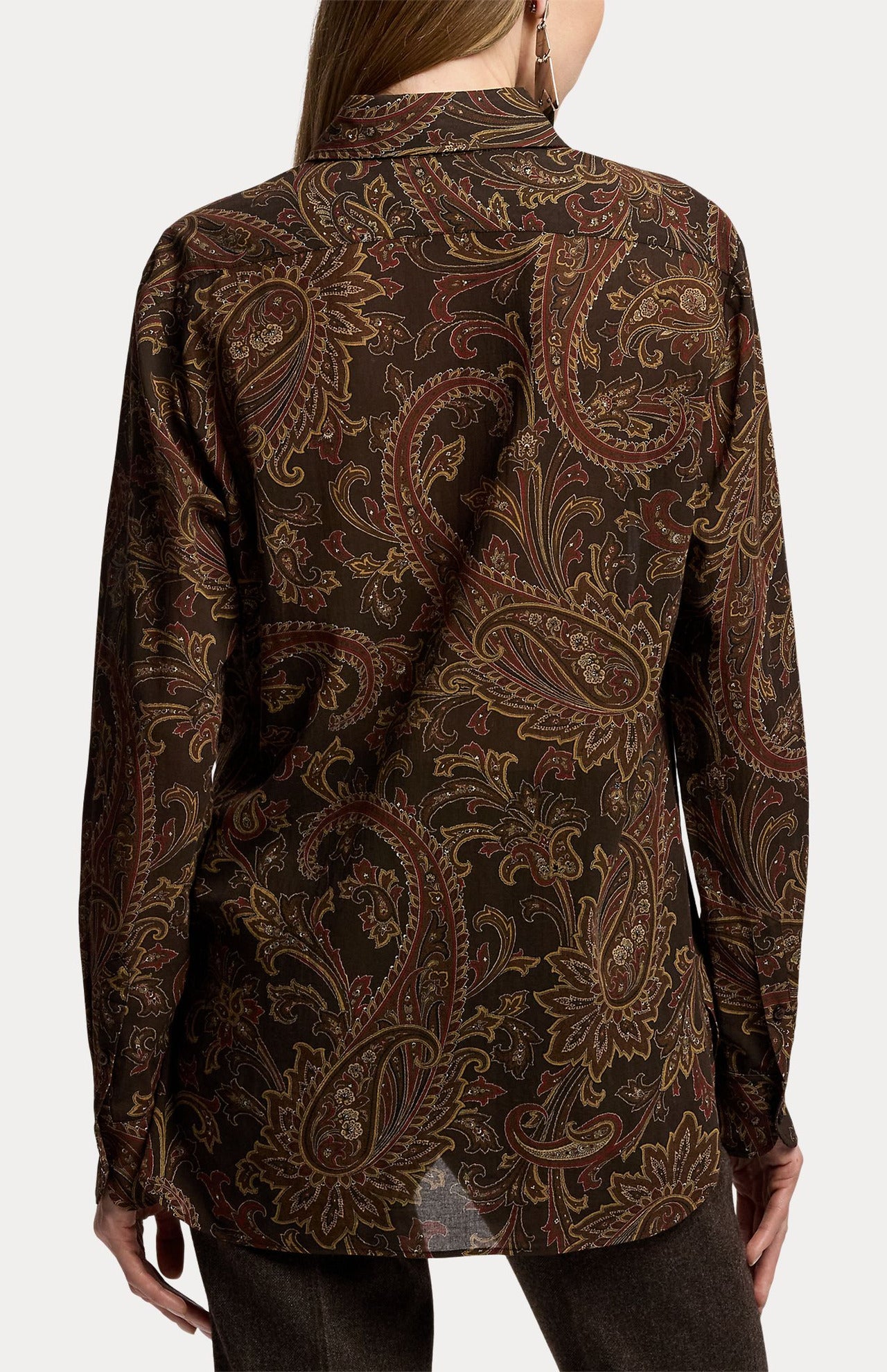 Back view of a person wearing a RALPH LAUREN COLLECTION Paisley Collared Long Sleeve Blouse in dark brown and tan paisley print.