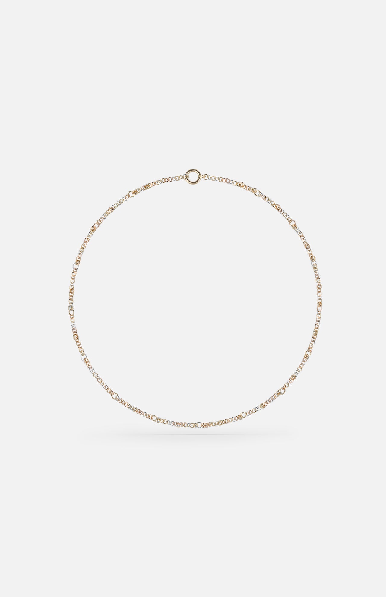 The Gravity Chain 20" Necklace by SPINELLI KILCOLLIN is a delicate gold piece with evenly spaced clear gemstones in a circular design, ideal for handmade jewelry enthusiasts.