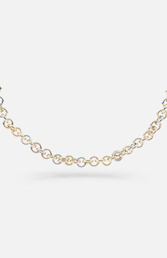 The SPINELLI KILCOLLIN Gravity Chain 20" Necklace showcases interlocking links in yellow, white, and rose gold, highlighting handmade artistry against a plain white background.
