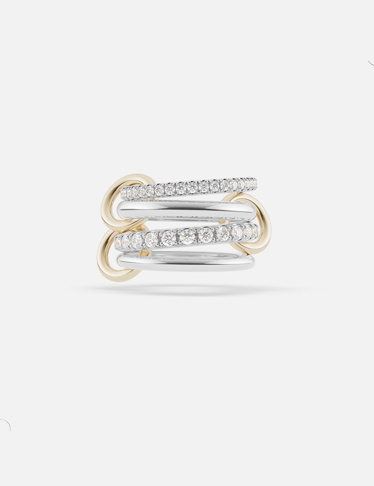 The Halley Deux Diamond Band Ring by SPINELLI KILCOLLIN showcases intertwined gold and sterling silver bands, some accented with round diamonds. Gold connectors complete this elegant design, photographed on a plain white background.