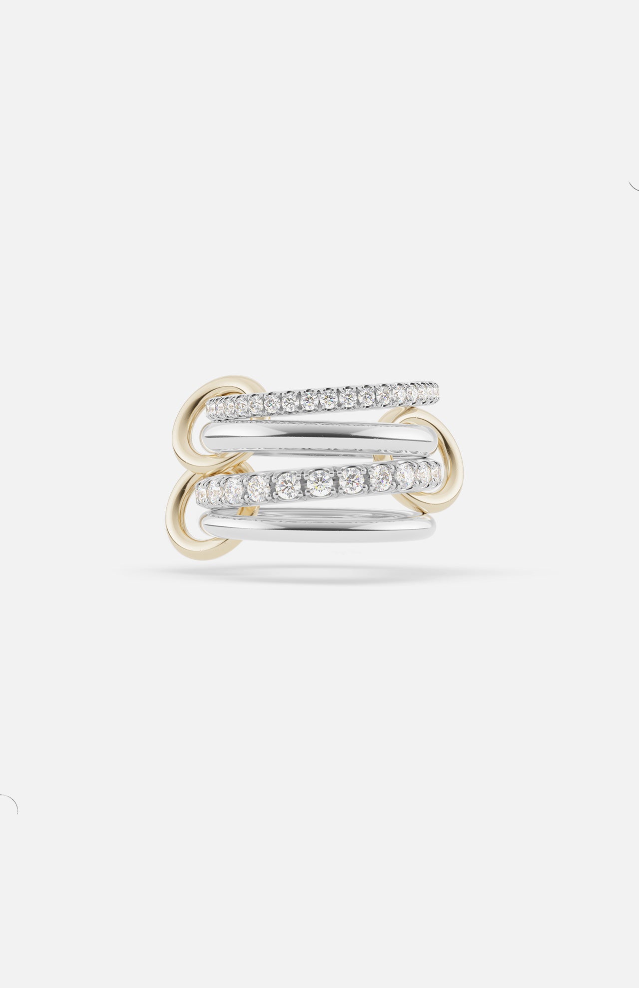 The Halley Deux Diamond Band Ring by SPINELLI KILCOLLIN showcases intertwined gold and sterling silver bands, some accented with round diamonds. Gold connectors complete this elegant design, photographed on a plain white background.