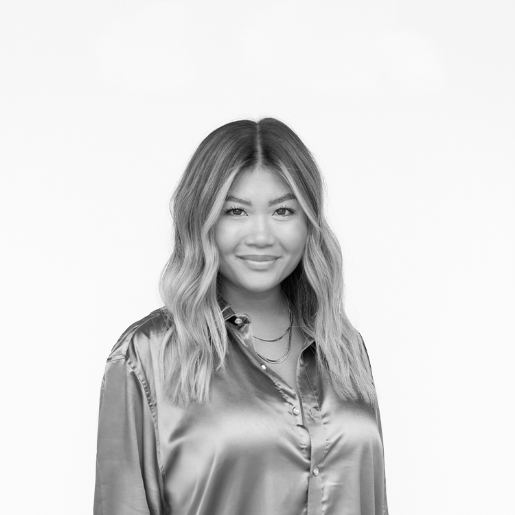 Photo of Hong Tran, the Men's Merchandise Coordinator at A.K. Rikk's.