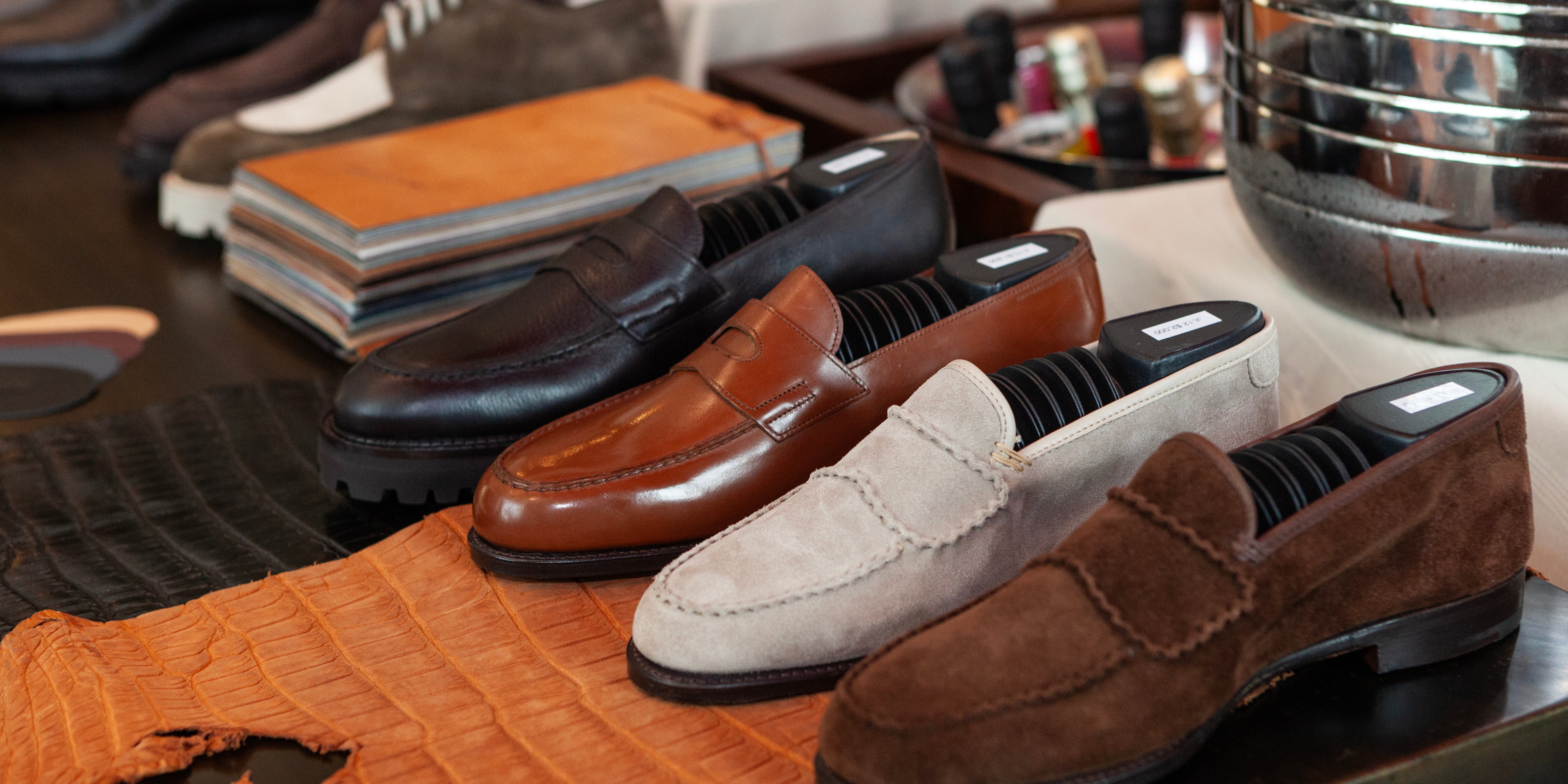Row of loafers on a display table with a blurred background
