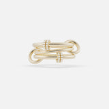 The Jovie Double Pave Ring by SPINELLI KILCOLLIN features a modular gold design with interlocking links and two rows of sparkling diamonds accenting the central links, shown on a plain white background.