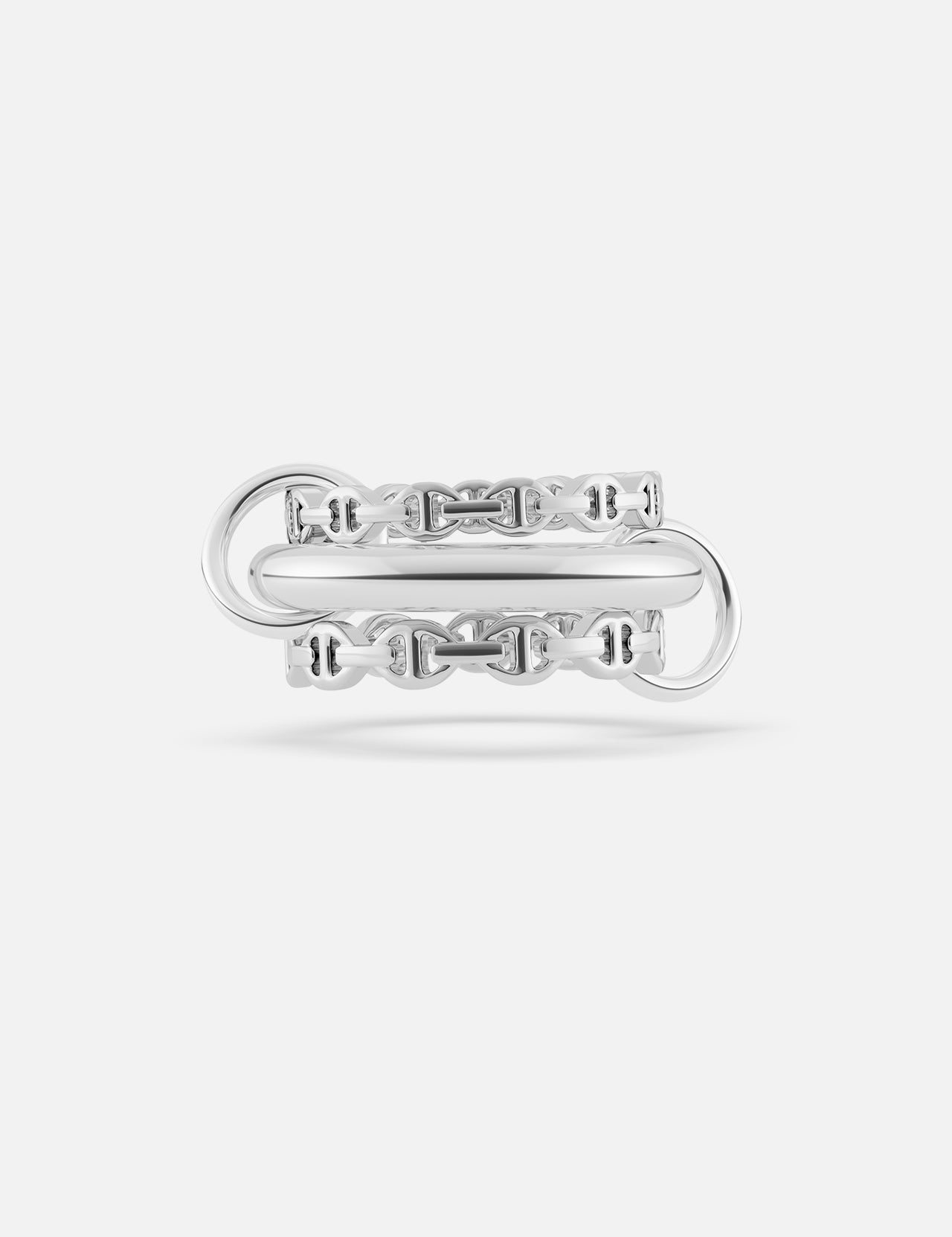 The Microdame SK Ring by SPINELLI KILCOLLIN features a bold double-band sterling silver design with interlocking chain details, inspired by the brand's iconic modular jewelry style, shown on a plain white background.