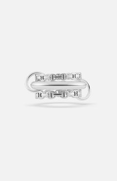 The Microdame SK Ring by SPINELLI KILCOLLIN features a bold double-band sterling silver design with interlocking chain details, inspired by the brand's iconic modular jewelry style, shown on a plain white background.