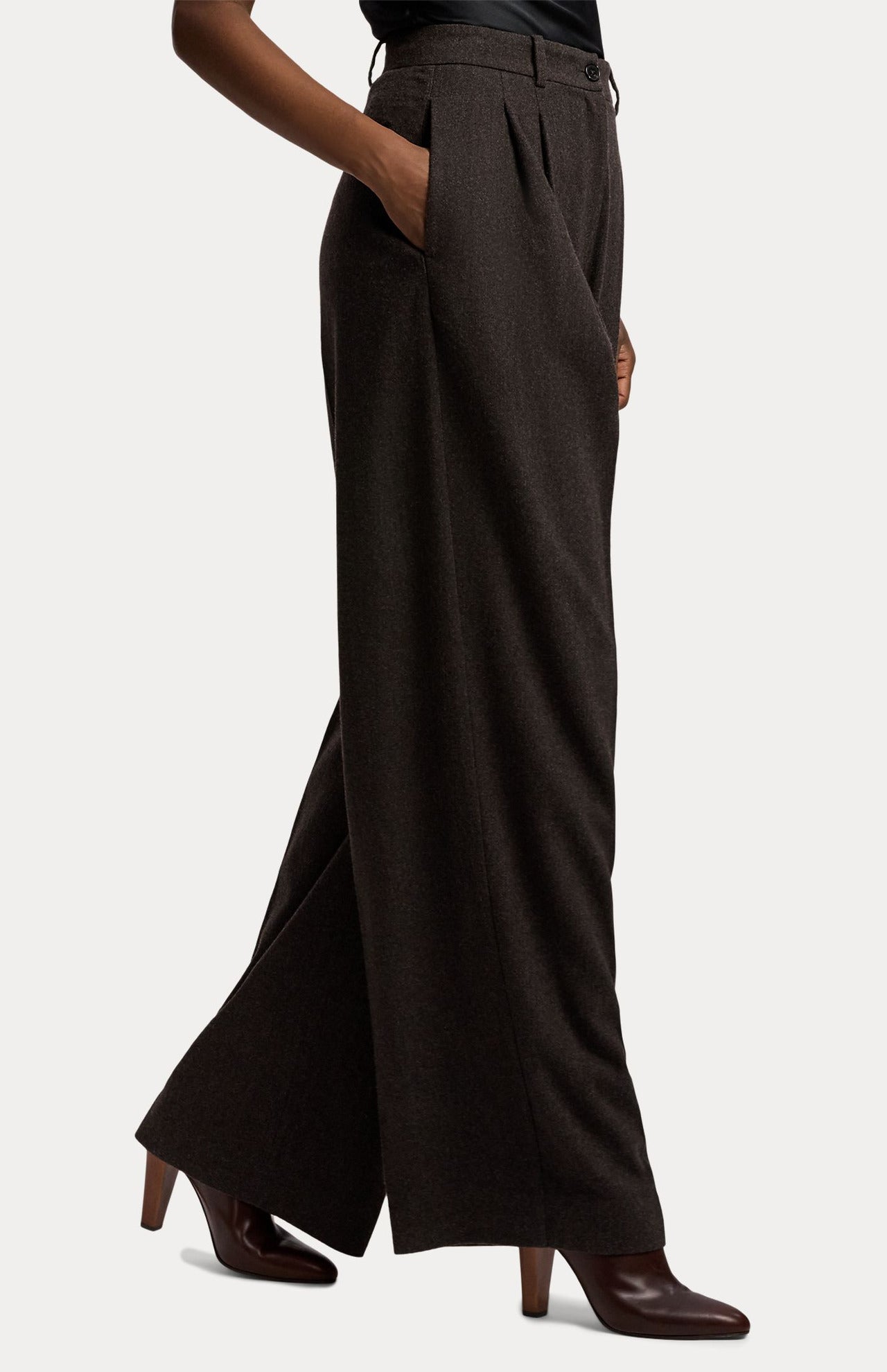 RALPH LAUREN COLLECTION Mini Herringbone Standard Pants in a high-waisted, wide-leg dark grey herringbone wool flannel, worn with dark brown leather heeled boots.