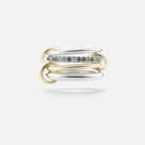 The SPINELLI KILCOLLIN Nimbus 4 Band Diamond Ring features overlapping gold and silver bands, with a central band embellished with sparkling diamonds, set against a plain white background.