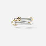The Raneth 3 Band Ring by SPINELLI KILCOLLIN features intertwined sterling silver and gold polished bands in a modern, minimalist open design with smooth, overlapping loops. Shown against a white background.