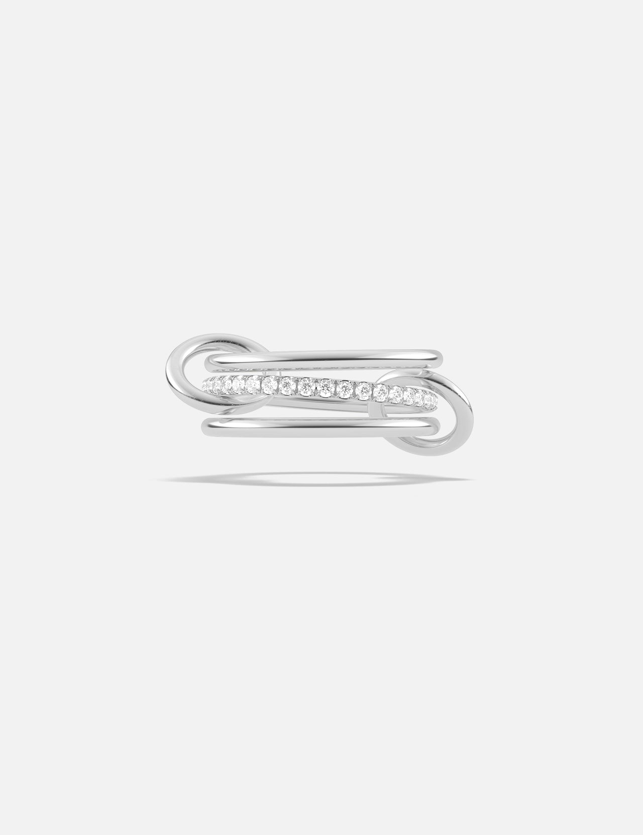 The Sonny Pavé Band Ring by SPINELLI KILCOLLIN is a sterling silver ring with a modern open-ended design, showcasing pavé diamonds along one curved side, shown against a plain white background.