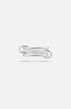 The Sonny Pavé Band Ring by SPINELLI KILCOLLIN is a sterling silver ring with a modern open-ended design, showcasing pavé diamonds along one curved side, shown against a plain white background.