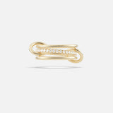 The SPINELLI KILCOLLIN Sonny Pavé Band Ring showcases an elegant looping yellow gold design with a row of sparkling pavé diamonds set at the center, displayed against a plain white background.