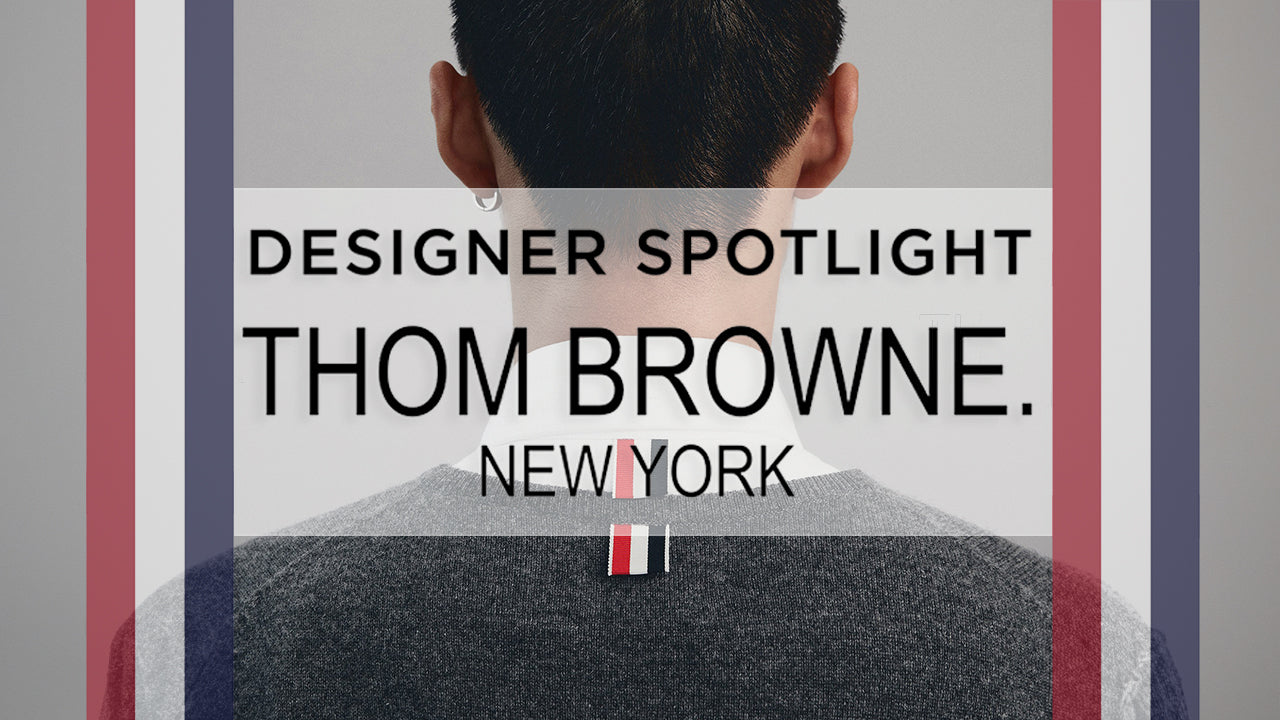 image with text "Designer Spotlight Thom Browne New York" image is of the back of a models head with a grey sweat and white collared shirt on